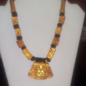 Luxurious Gold and Black Statement Necklace